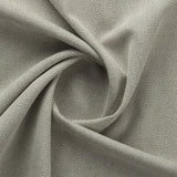 Bekleidungsstoff aus recycelter Baumwolle mit Jacquard Fischgrat Musterung in resadagrün